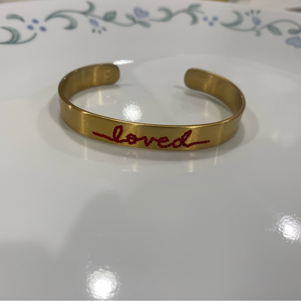 Roxanne Assoulin Loved stitch brass bracelet